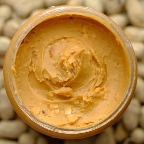 brown powder in brown round container